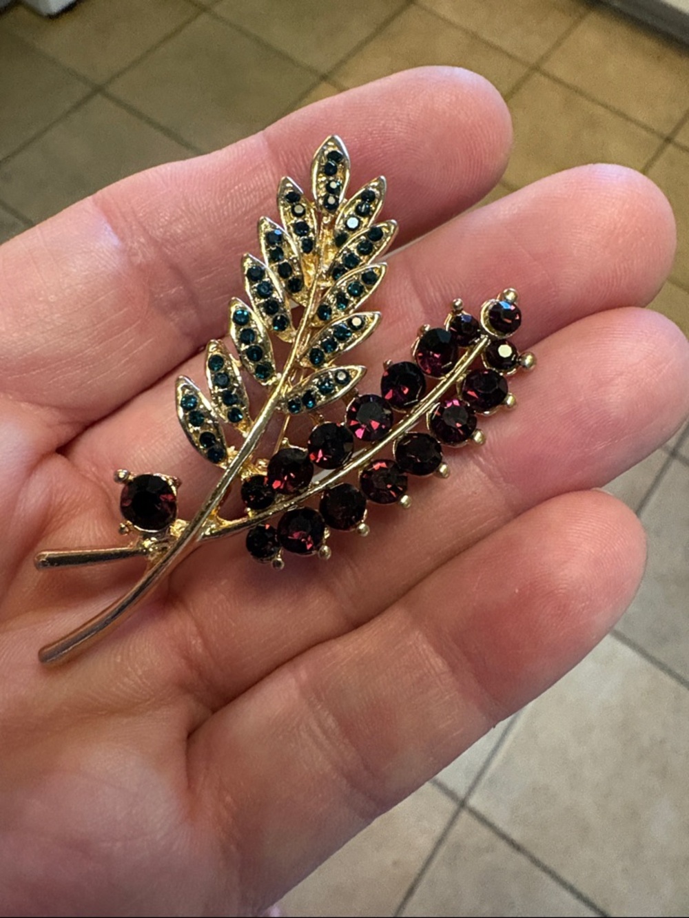 Gold-Tone Leaf Brooch with Garnet and Teal Crystals